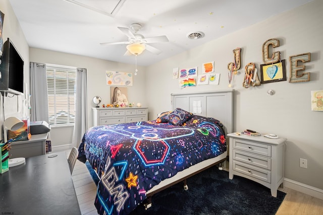 111 N Madison Ave Unit 2, Margate, NJ 08402 - bedroom featuring baseboards, ceiling fan, wood finished floors, and visible vents