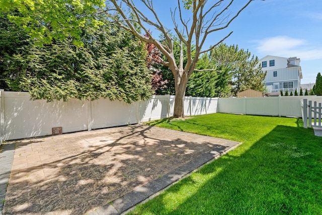 111 N Madison Ave Unit 2, Margate, NJ 08402 - view of yard with a fenced backyard and a patio area