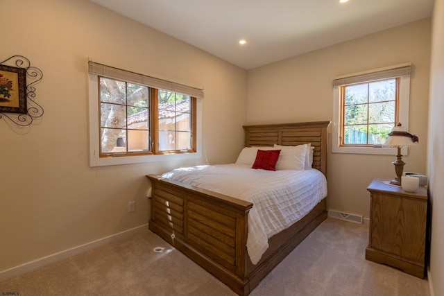 bedroom with carpet floors, recessed lighting, and baseboards