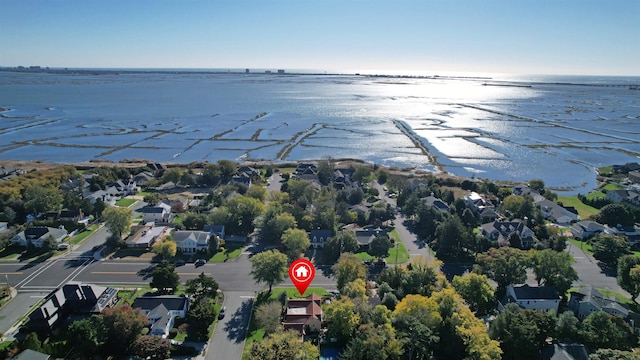 bird's eye view with a residential view and a water view