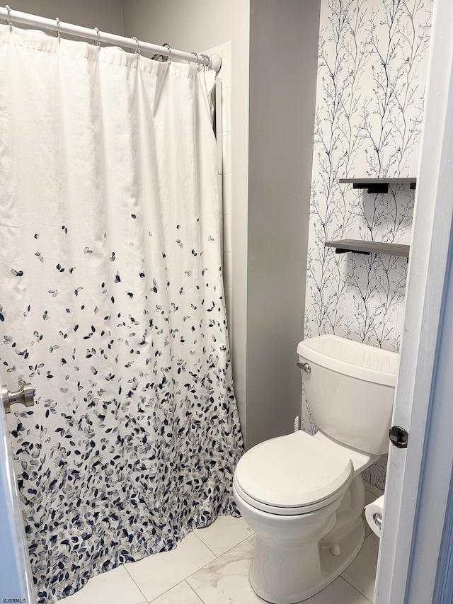 full bathroom with toilet and a shower with curtain