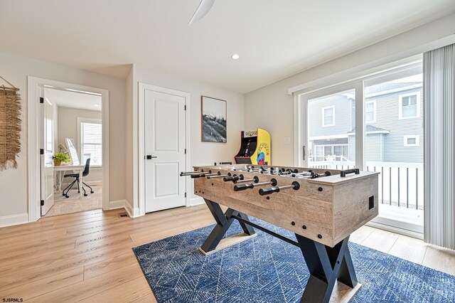 playroom featuring light wood-style floors, recessed lighting, and baseboards