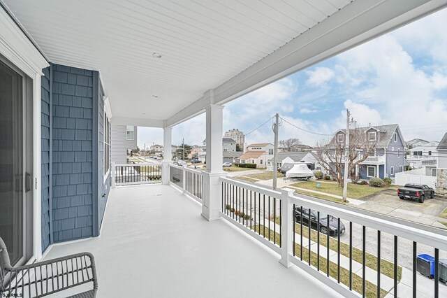 balcony with a porch and a residential view
