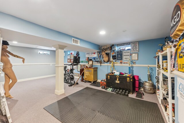 below grade area featuring carpet floors, recessed lighting, baseboards, and visible vents