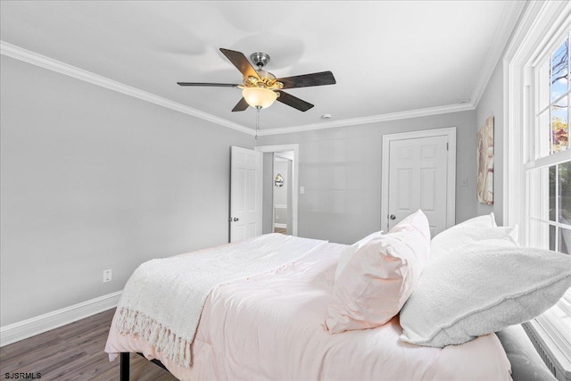 626 1st St, Northfield, NJ 08225 - bedroom with baseboards, ornamental molding, a ceiling fan, and dark wood-type flooring