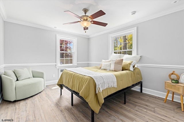 626 1st St, Northfield, NJ 08225 - bedroom with crown molding, baseboards, and wood finished floors
