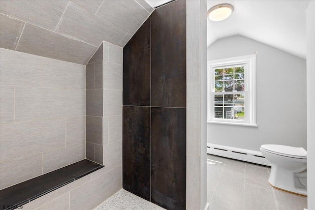 626 1st St, Northfield, NJ 08225 - bathroom with toilet, tile patterned floors, lofted ceiling, a baseboard radiator, and tiled shower