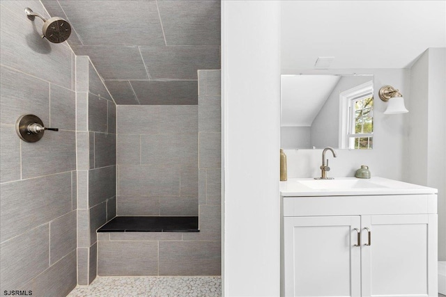 626 1st St, Northfield, NJ 08225 - full bath with tiled shower, lofted ceiling, and vanity