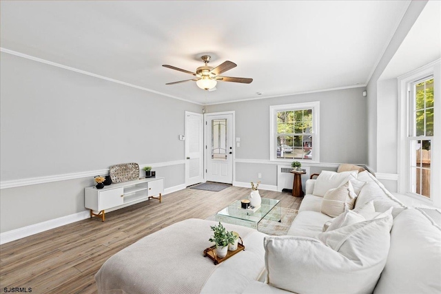 626 1st St, Northfield, NJ 08225 - living area featuring baseboards, a ceiling fan, radiator, and wood finished floors
