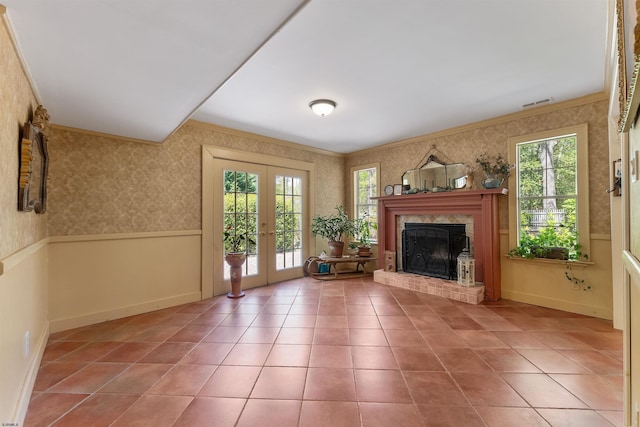 711 Falcon Crest Pl, Smithville, NJ 08205 - unfurnished living room featuring wallpapered walls, plenty of natural light, french doors, tile patterned floors, and ornamental molding