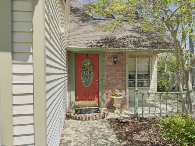 711 Falcon Crest Pl, Smithville, NJ 08205 - property entrance with roof with shingles and fence
