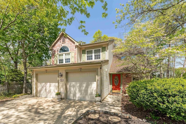 711 Falcon Crest Pl, Smithville, NJ 08205 - traditional home with a garage, fence, and driveway