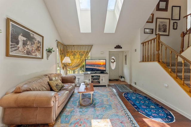 711 Falcon Crest Pl, Smithville, NJ 08205 - living room with a skylight, high vaulted ceiling, stairway, wood finished floors, and baseboards
