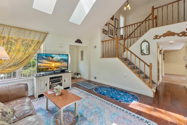 711 Falcon Crest Pl, Smithville, NJ 08205 - living room with high vaulted ceiling, stairway, wood finished floors, a skylight, and baseboards