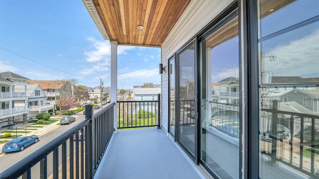 balcony featuring a residential view