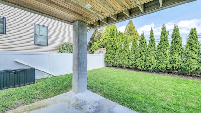 view of yard featuring a patio and fence