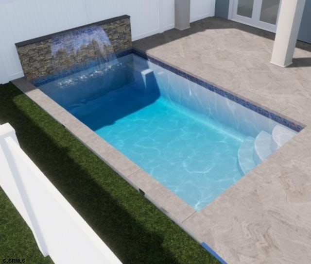 pool with a patio