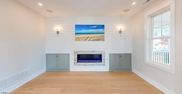 933 Oak Grv, Linwood, NJ 08221 - unfurnished living room featuring visible vents, wood finished floors, baseboards, recessed lighting, and a high end fireplace