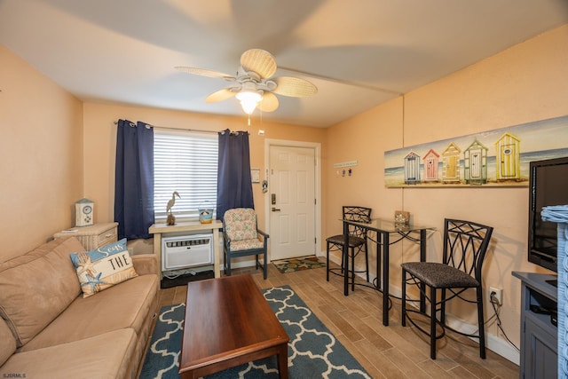 921 Wesley Ave Unit B21, Ocean City, NJ 08226 - living room featuring wood finished floors, a ceiling fan, baseboards, and a wall mounted AC