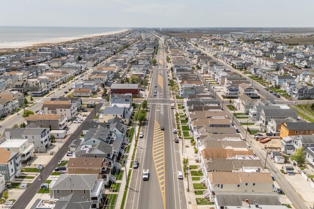 birds eye view of property featuring a residential view and a water view