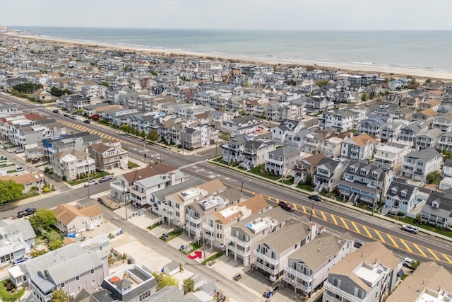 aerial view featuring a beach view and a water view