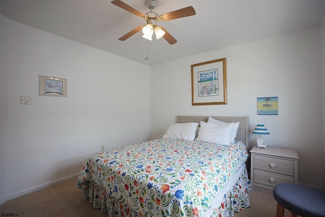 bedroom featuring carpet floors, baseboards, and ceiling fan