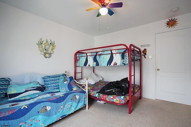 bedroom featuring carpet and a ceiling fan