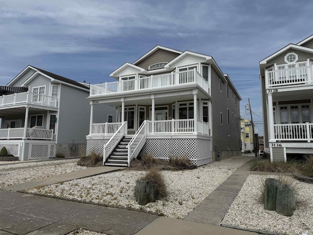 view of front facade with a porch and a balcony