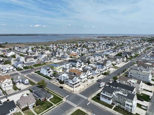 aerial view with a water view and a residential view