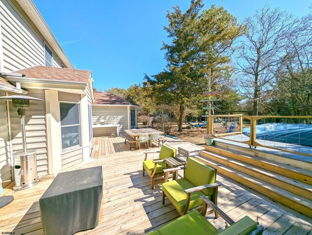 7 Staples Ct, Beesleys Point, NJ 08223 - deck featuring outdoor dining space