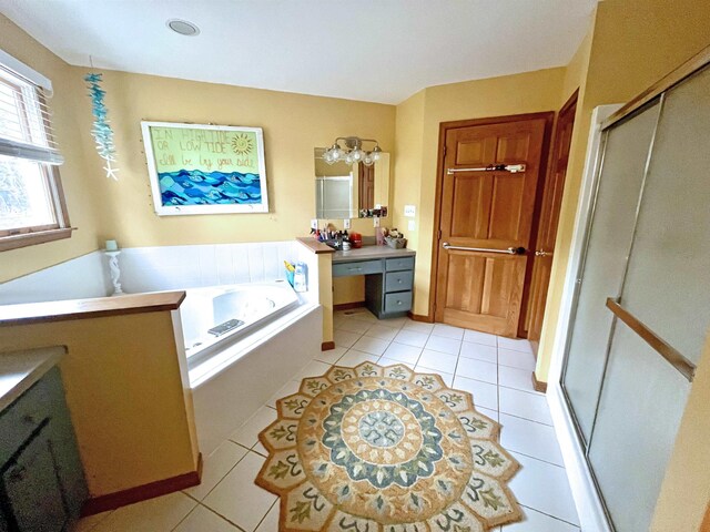 7 Staples Ct, Beesleys Point, NJ 08223 - bathroom featuring a stall shower, tile patterned floors, vanity, and a bath