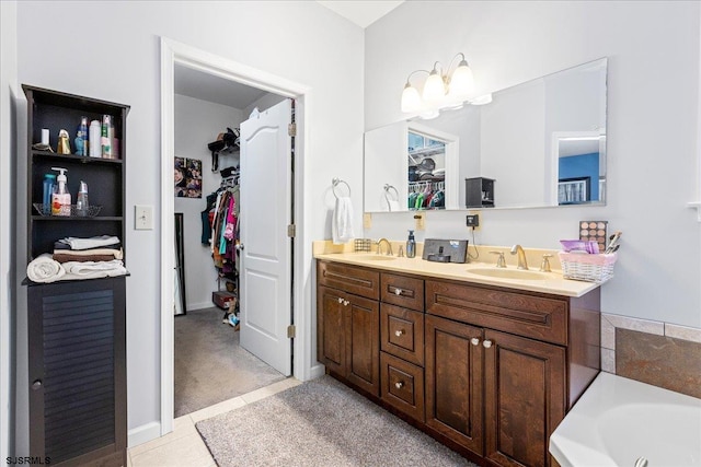 5905 Hickory St, Mays Landing, NJ 08330 - bathroom with a walk in closet, double vanity, and a bath