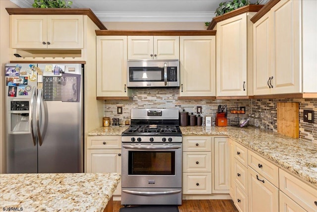 5905 Hickory St, Mays Landing, NJ 08330 - kitchen with appliances with stainless steel finishes, ornamental molding, tasteful backsplash, light stone countertops, and dark wood finished floors
