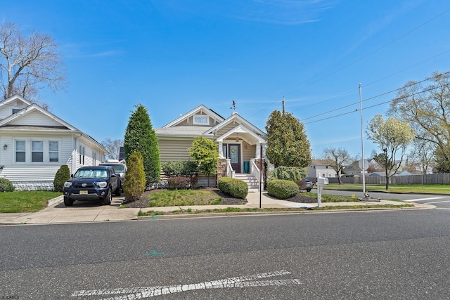 view of front of home featuring concrete driveway