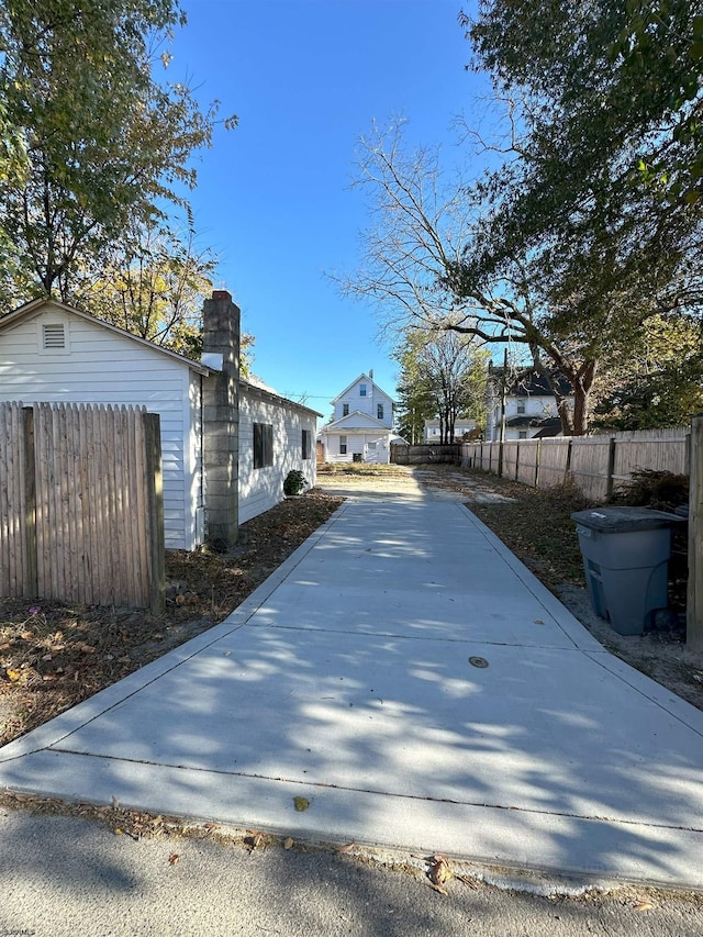 view of road featuring driveway