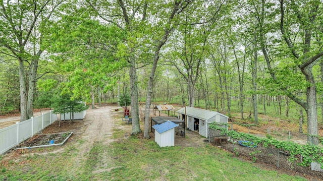 411 Spencer Ln, Galloway Township, NJ 08205 - view of yard featuring an outbuilding, fence, and exterior structure