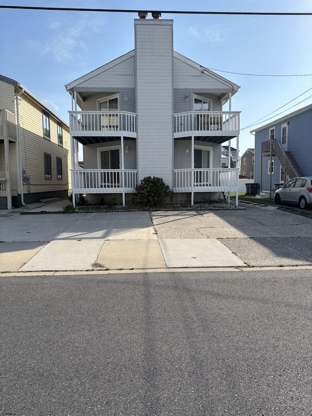 view of front of home with a chimney