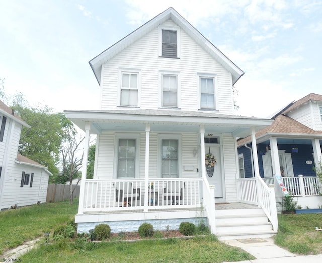farmhouse inspired home with a porch
