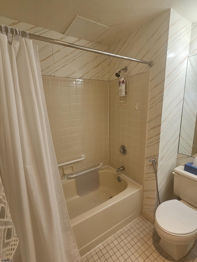 bathroom with tile patterned floors, toilet, and shower / bathtub combination with curtain