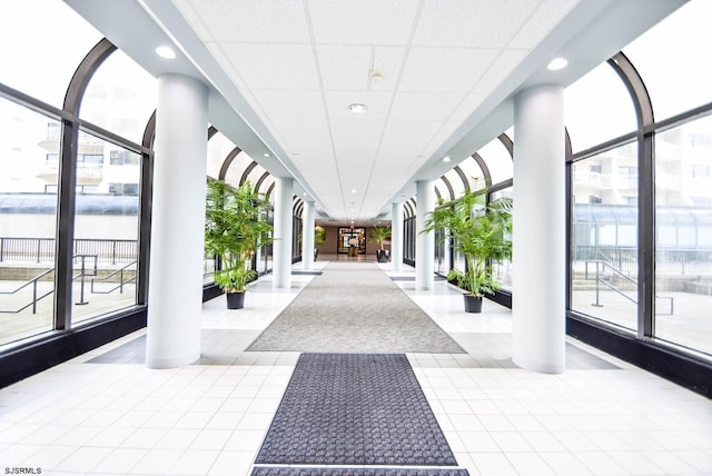 building lobby featuring a drop ceiling