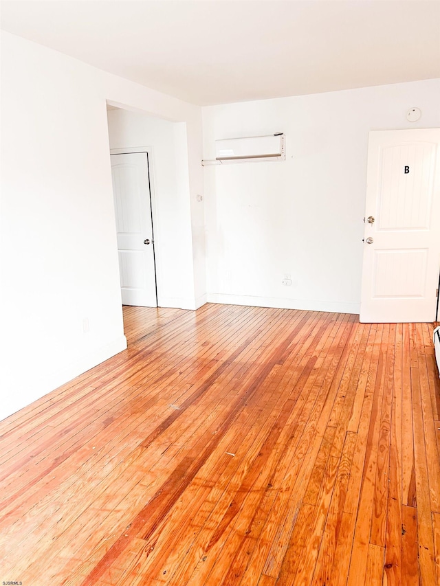 empty room with light wood-style floors
