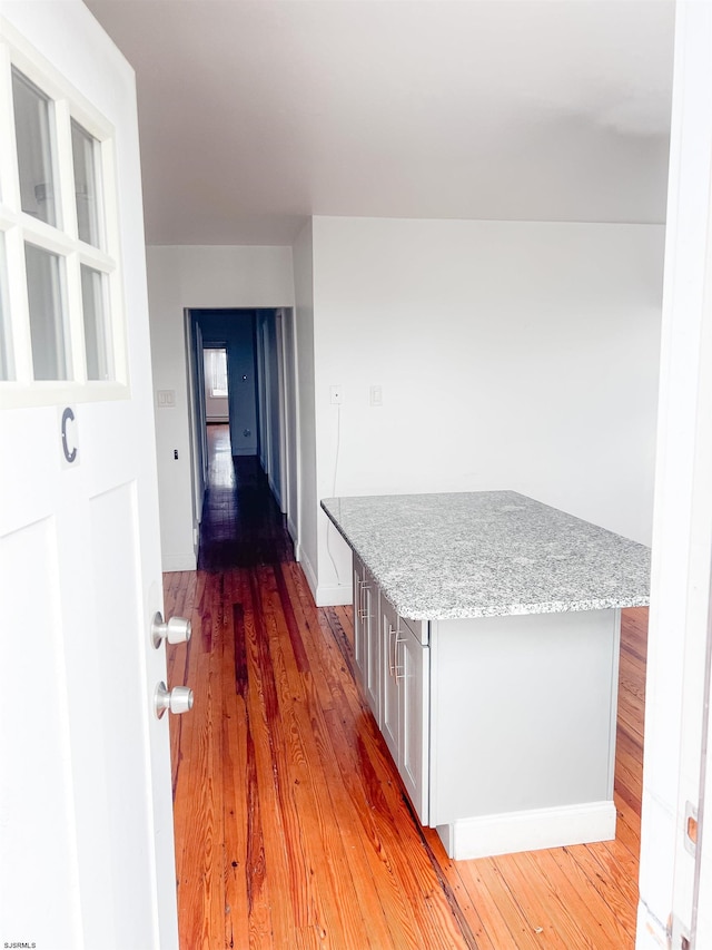hallway featuring light wood-type flooring