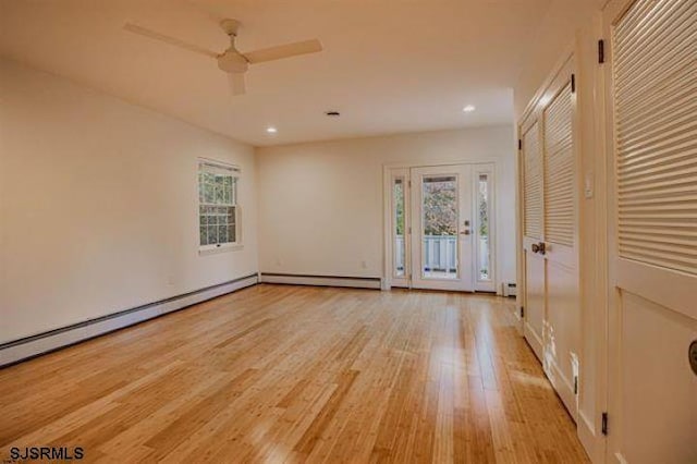 862 Central Ave, Hammonton, NJ 08037 - unfurnished room featuring light wood-type flooring, a ceiling fan, recessed lighting, baseboard heating, and a baseboard heating unit