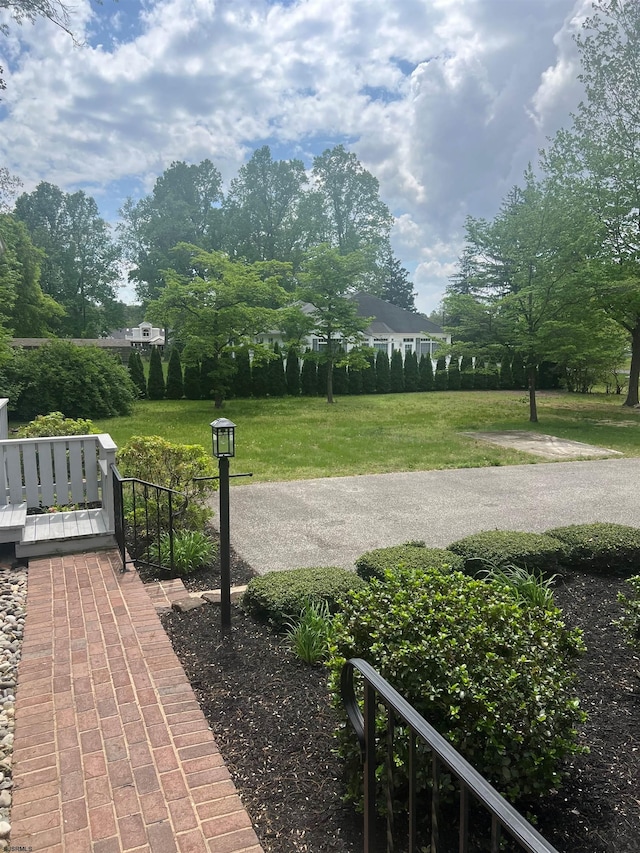 862 Central Ave, Hammonton, NJ 08037 - surrounding community with a yard and view of wooded area