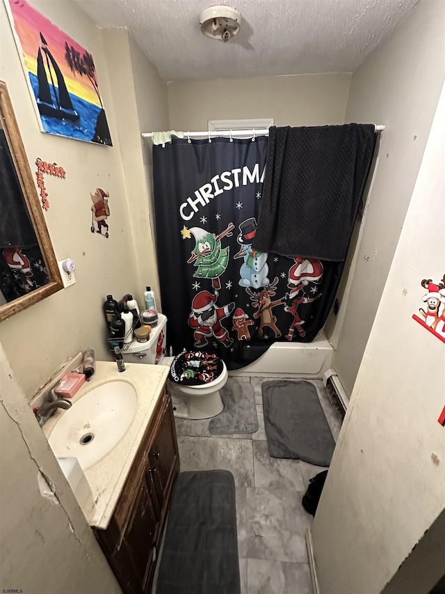full bath featuring a textured ceiling, vanity, a shower with shower curtain, and toilet