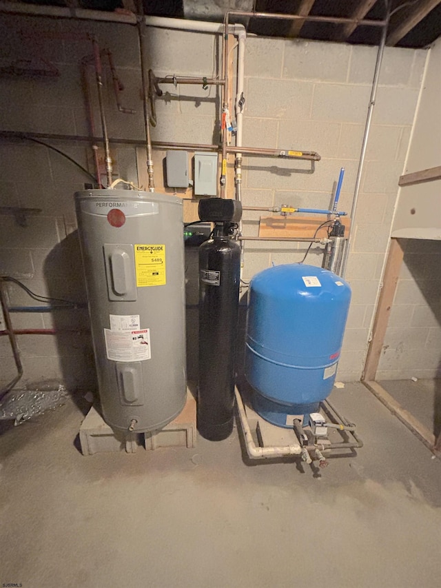 utility room featuring electric water heater