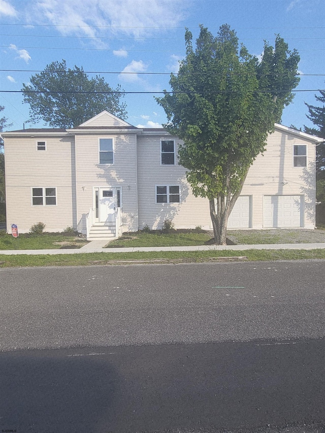 view of front of home with brick siding