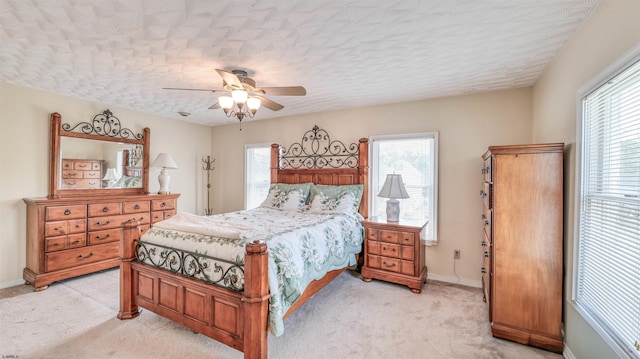 919 Broad St, Pleasantville, NJ 08232 - bedroom featuring light carpet, ceiling fan, baseboards, and a textured ceiling