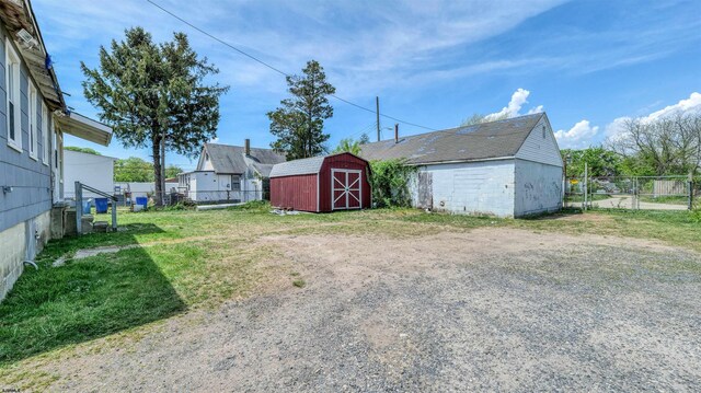 919 Broad St, Pleasantville, NJ 08232 - view of yard with an outdoor structure and a shed