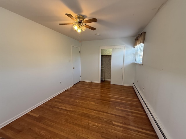 8508 Wellington Ave, Margate, NJ 08402 - unfurnished bedroom featuring a baseboard radiator, wood finished floors, baseboards, and a ceiling fan